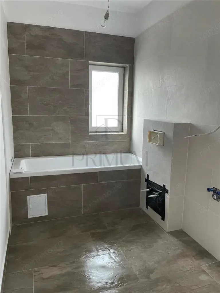 Sacalaz- toate utilitatile- strada asfaltata- dormitor cu baie si dressing- teren generos- incalzire