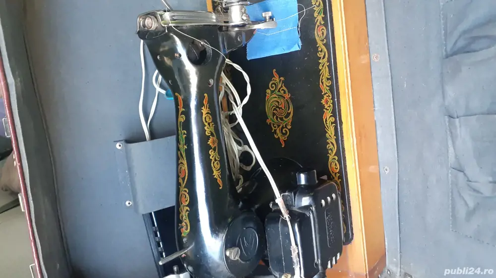Mașină de cusut electrică.