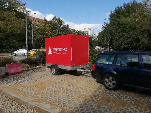 Efectuez transport cu remorca