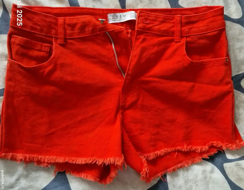 vand pantaloni scurti 