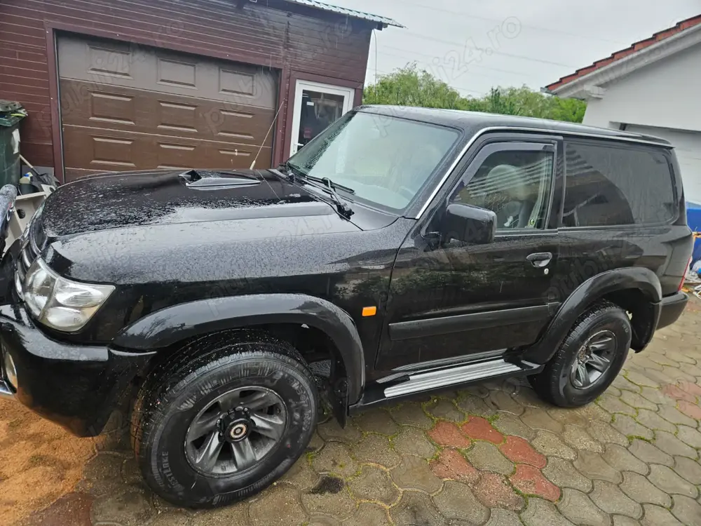 Vând Nissan Patrol, negru, an 2003, preț 13.000 euro