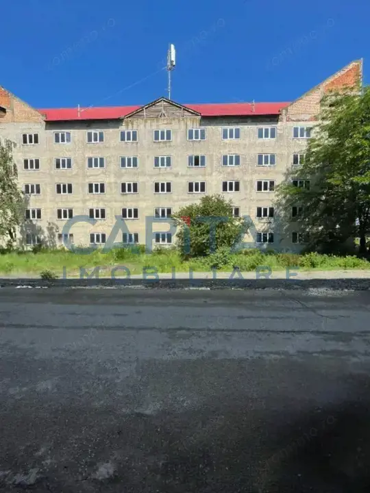 Bloc (camin nefamilisti) format din 70 de garsoniere