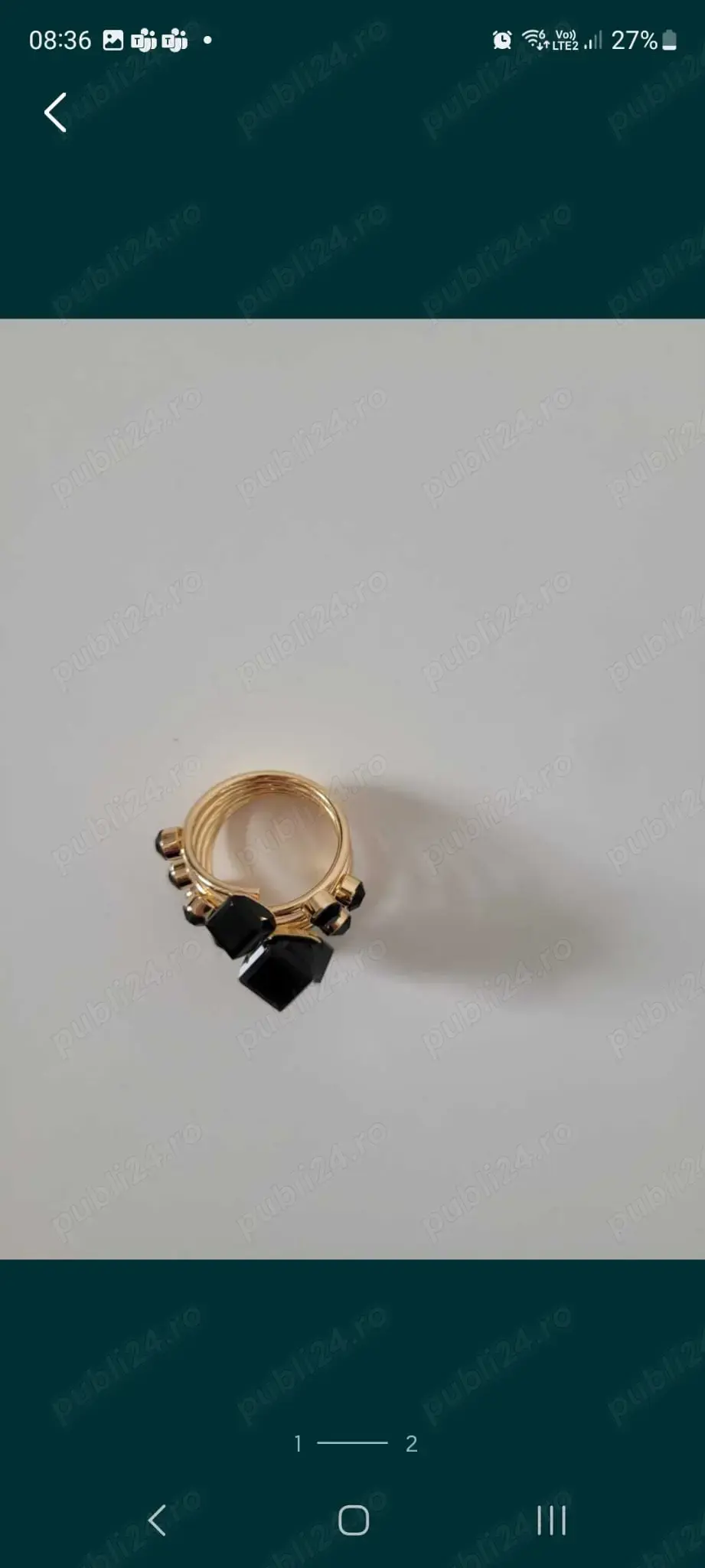 inel auriu cu pietre negre