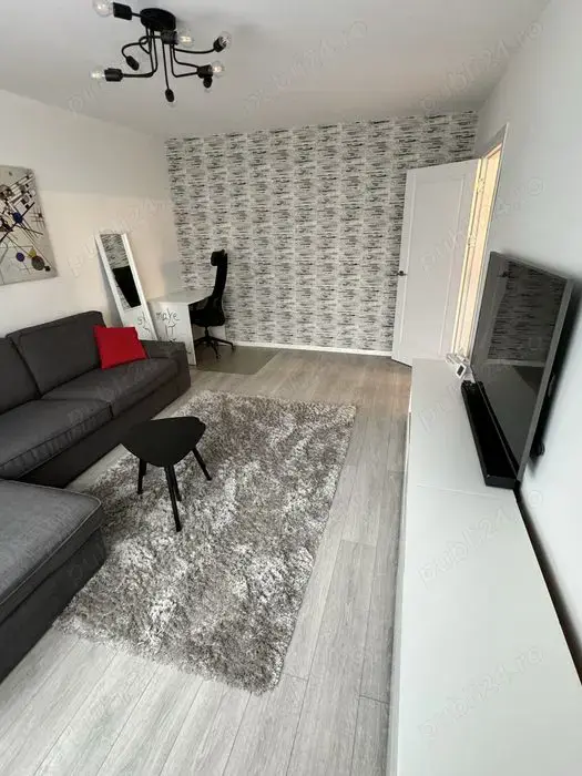 in Centru ofer chirie apartamnent cu 2 camere pe Blv Republicii