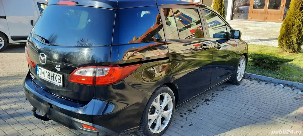 Vand mașina noastră  de familie Mazda 5 ,7 locuri ,cui remorca ,6 viteze pilot automat,etc  