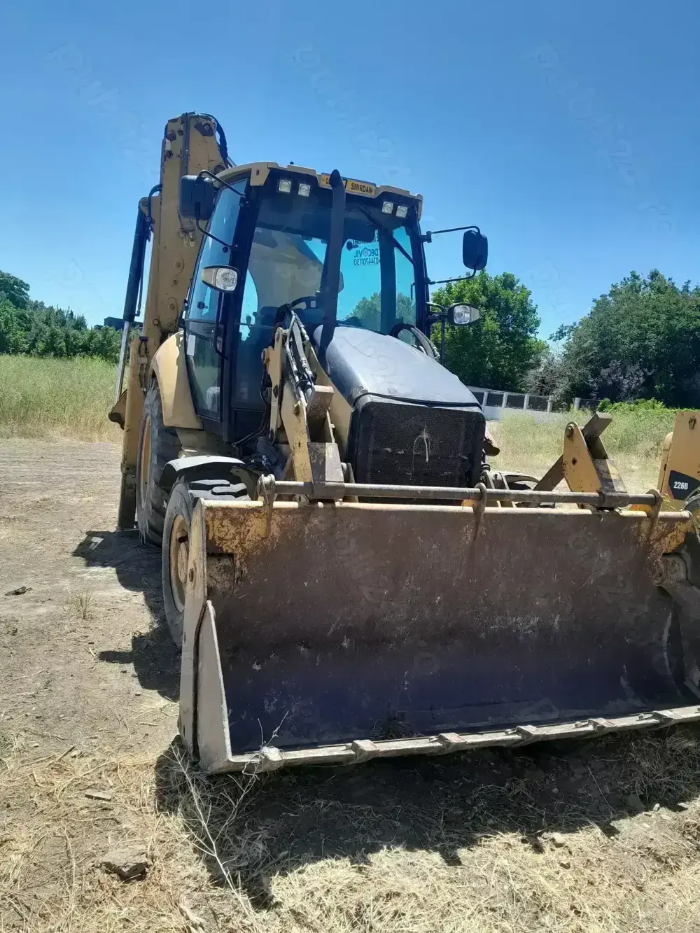 Buldoexcavator cat, prestari servicii