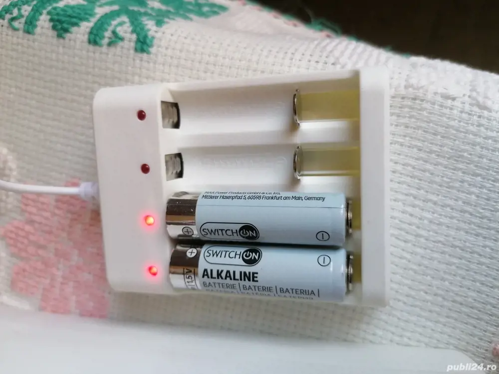 Încărcător bateri AA și Aaa preț 15 lei. 