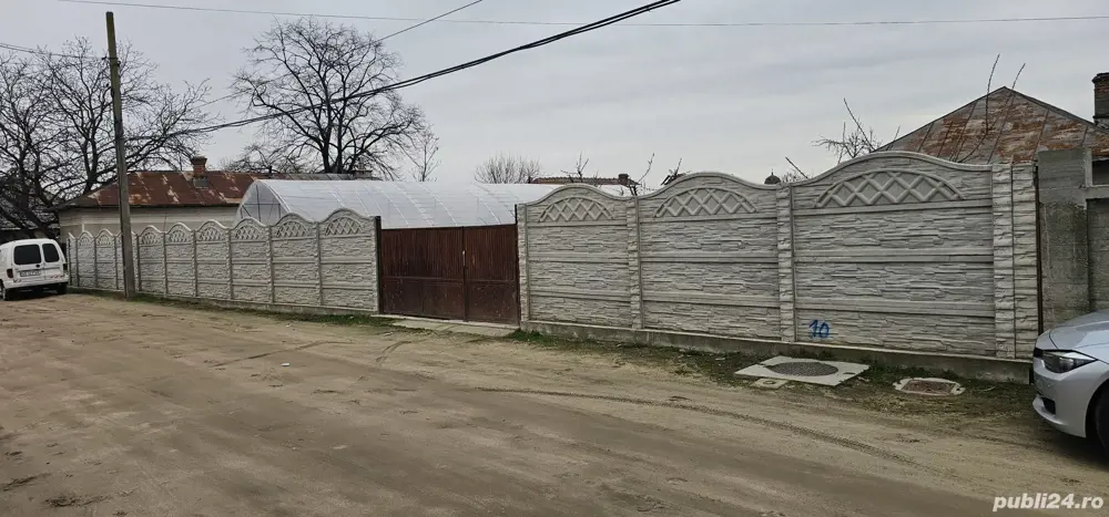 Teren intravilan si casa batraneasca 1313mp 