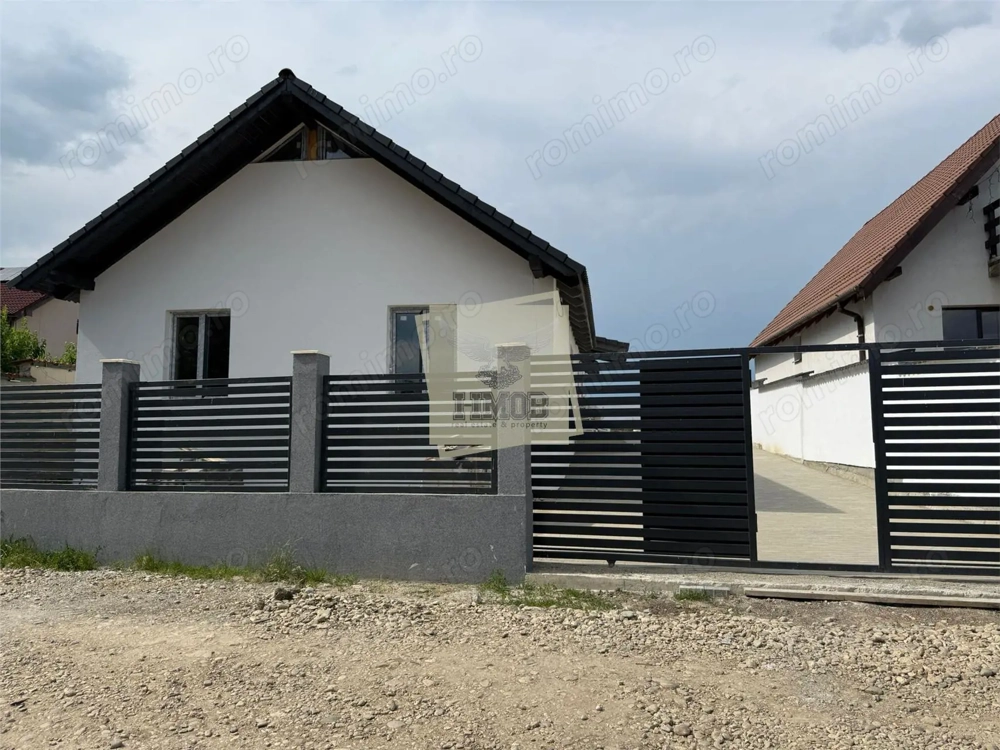 Casa individuala 4 camere 2 bai teren 500 mp la 8 km de Sibiu