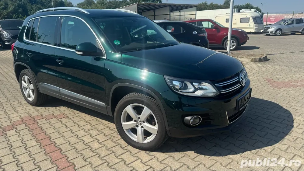 VW Tiguan, automat 4x4,Faruri Led, Navigatie Mare Color VW Tiguan, automat 4x4,Faruri Led, Navigatie Mare Color