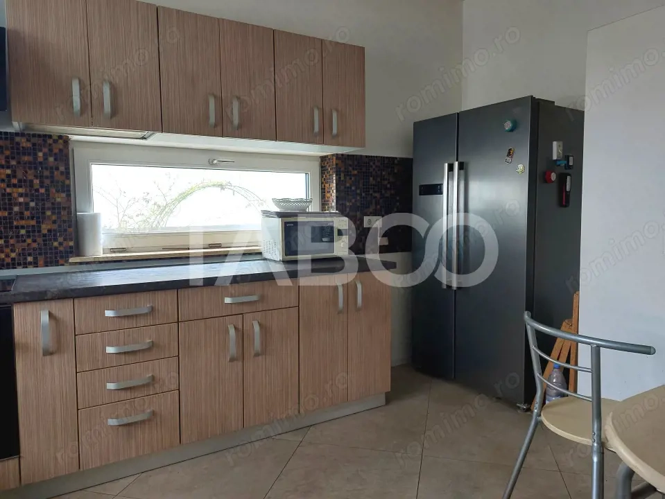 Casa individuala 4 camere P+1E 118 mp 322 mp parcela teren Cisnadie