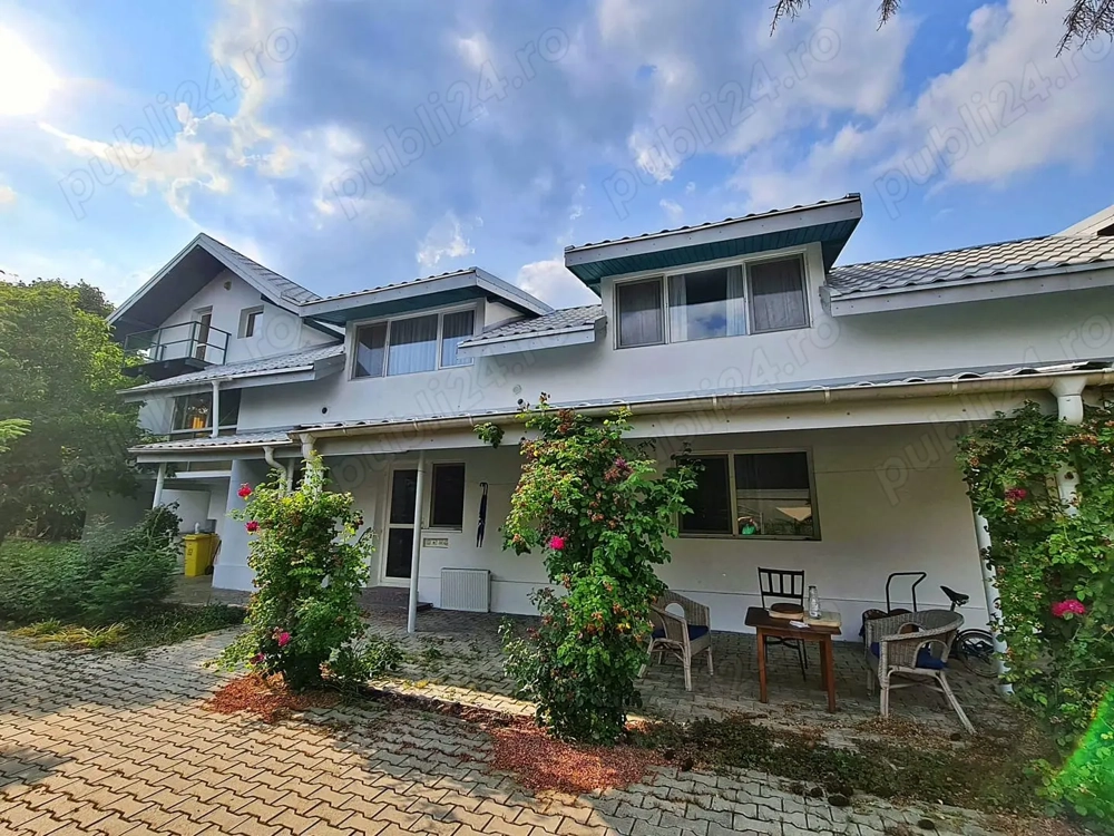 Proprietate unică în centrul Buftei   1.807 mp teren + 2 case + grădină superbă.