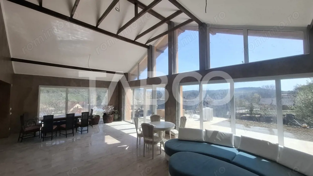 Casa de vanzare 405 mp utili 2 garaje 250 mp terase Slimnic Sibiu