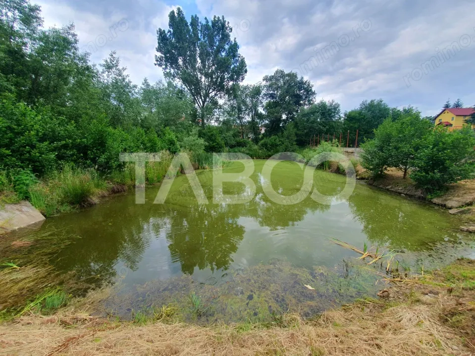 Teren intravilan 1500 mp - parcelabil - utilitati - Front 30 m