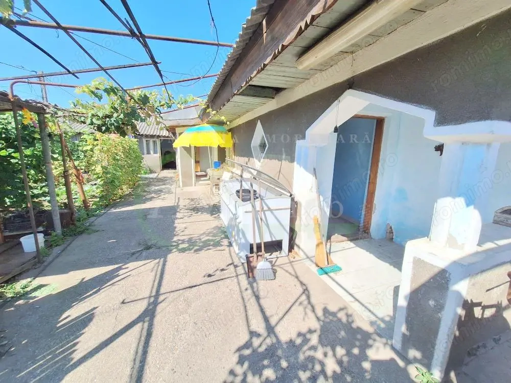 Teren 371 mp curti constructii+casa 5 camere si anexe, zona Izvoare