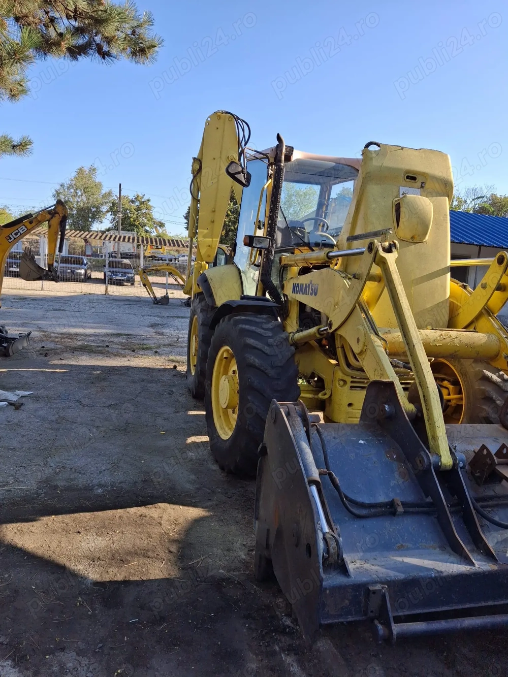 Vand buldoexcavator Komatsu