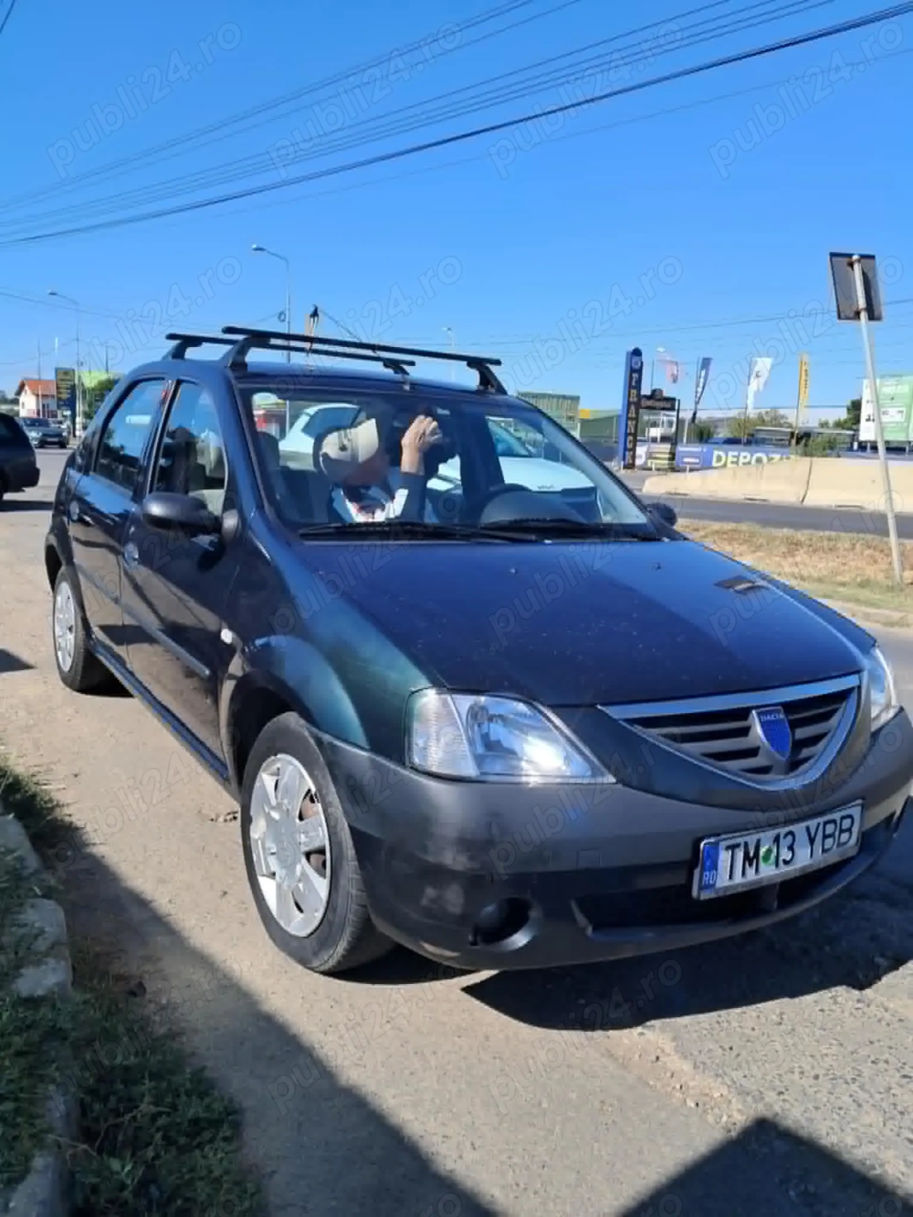 Vand dacia logan doar 67 de mi de cilometri