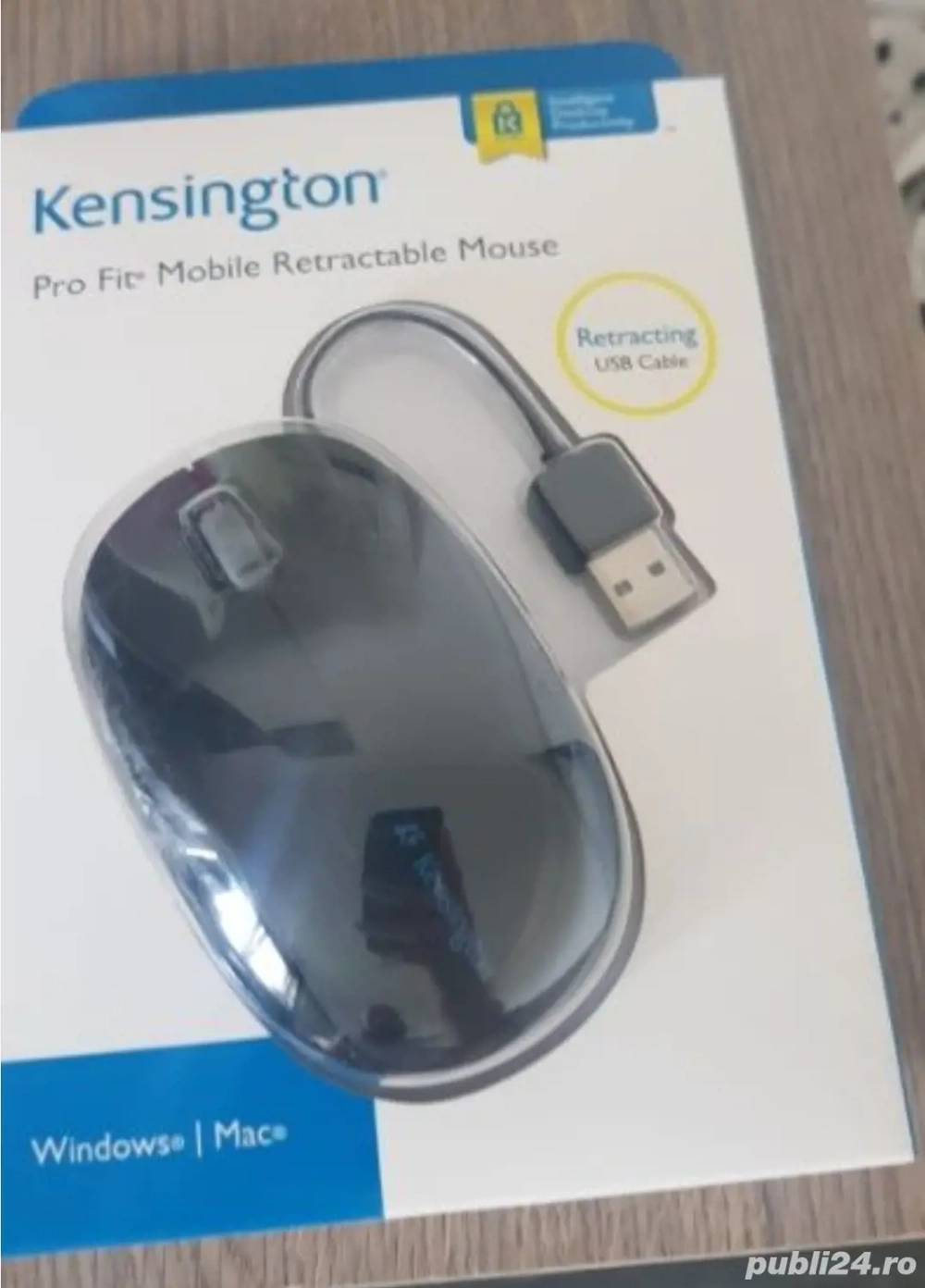 Mouse optic cu cablu retractabil in corpul mouse-ului