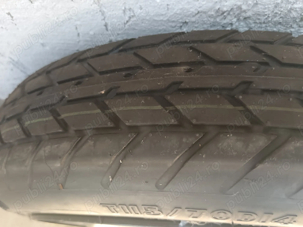 Roată rezervă îngustă .