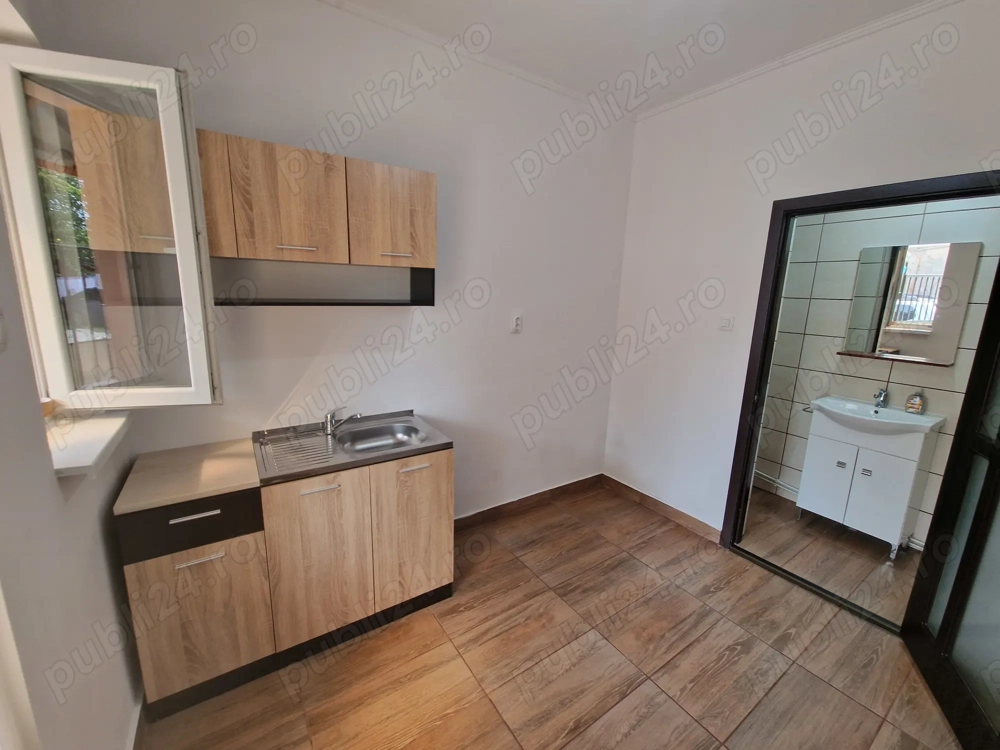 Vand apartament la casa cu  1 camera in curte comuna pe str. cuza voda