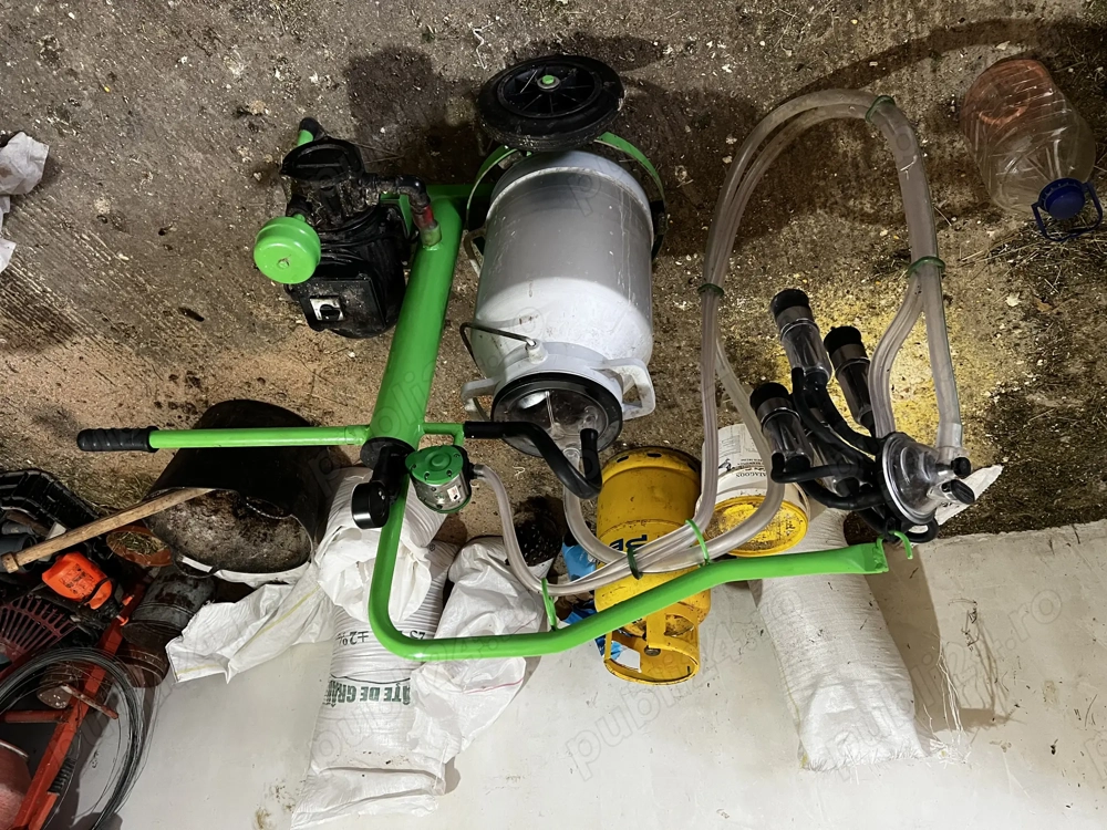 Mulgătoare automată.                  Mulgătoare automată.