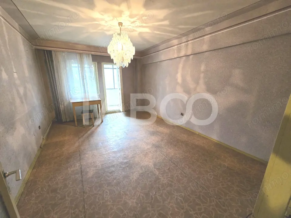 Apartament decomandat 4 camere 4 balcoane 2 bai etaj 1 Central Sibiu