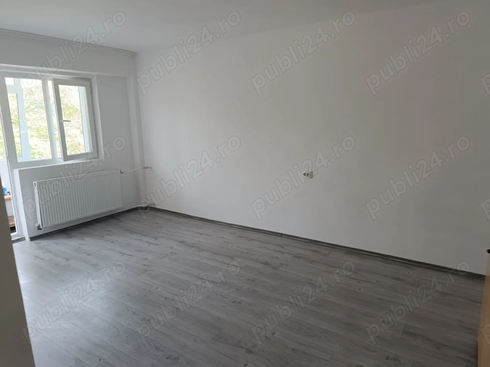 Închiriez apartament 2 camere, etaj 1, zonă centrală .