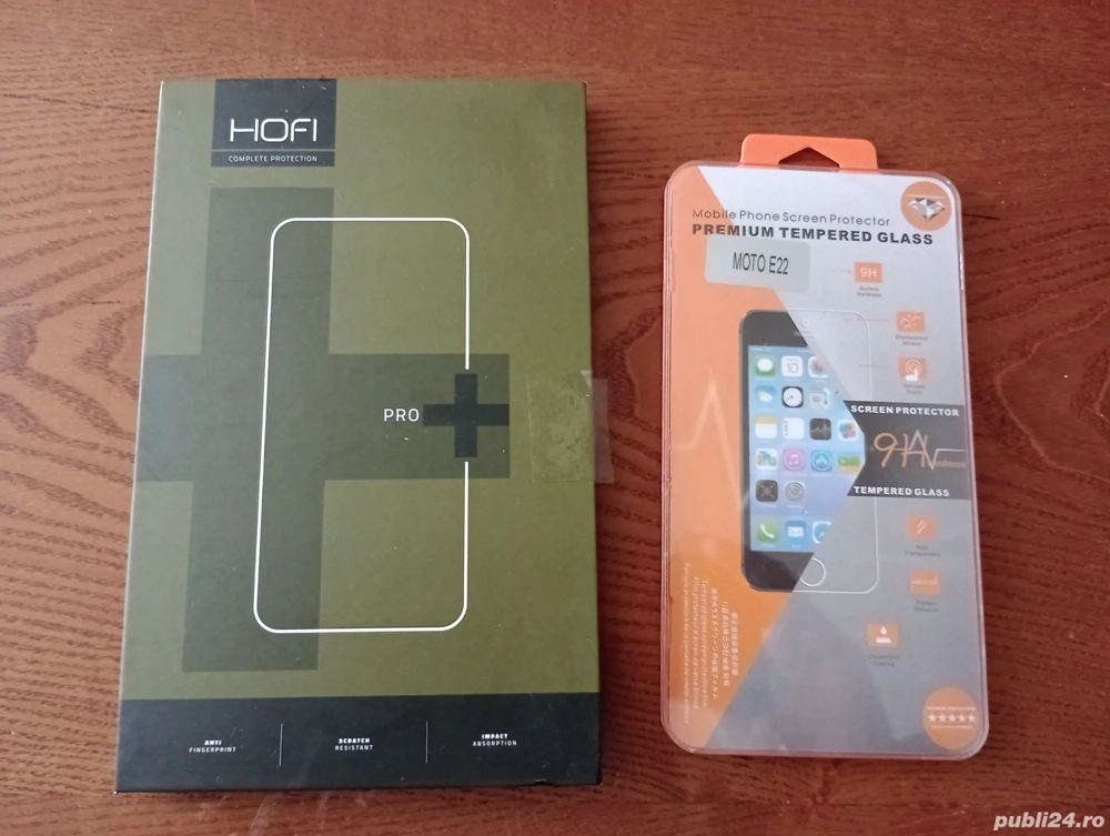 34. Două cutii goale de folii protecție pentru ecran telefon
