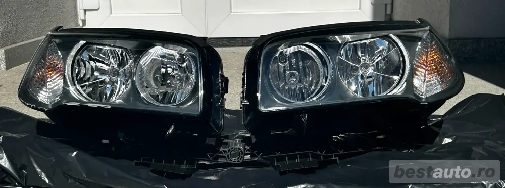 Set Faruri BMW X3 E83 (2004-2010), calitate OE Set Faruri BMW X3 E83 (2004-2010), calitate OE