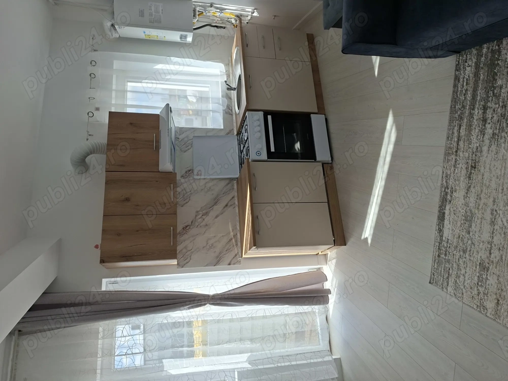 Închiriez garsoniera tip studiou cu curte si parcare 