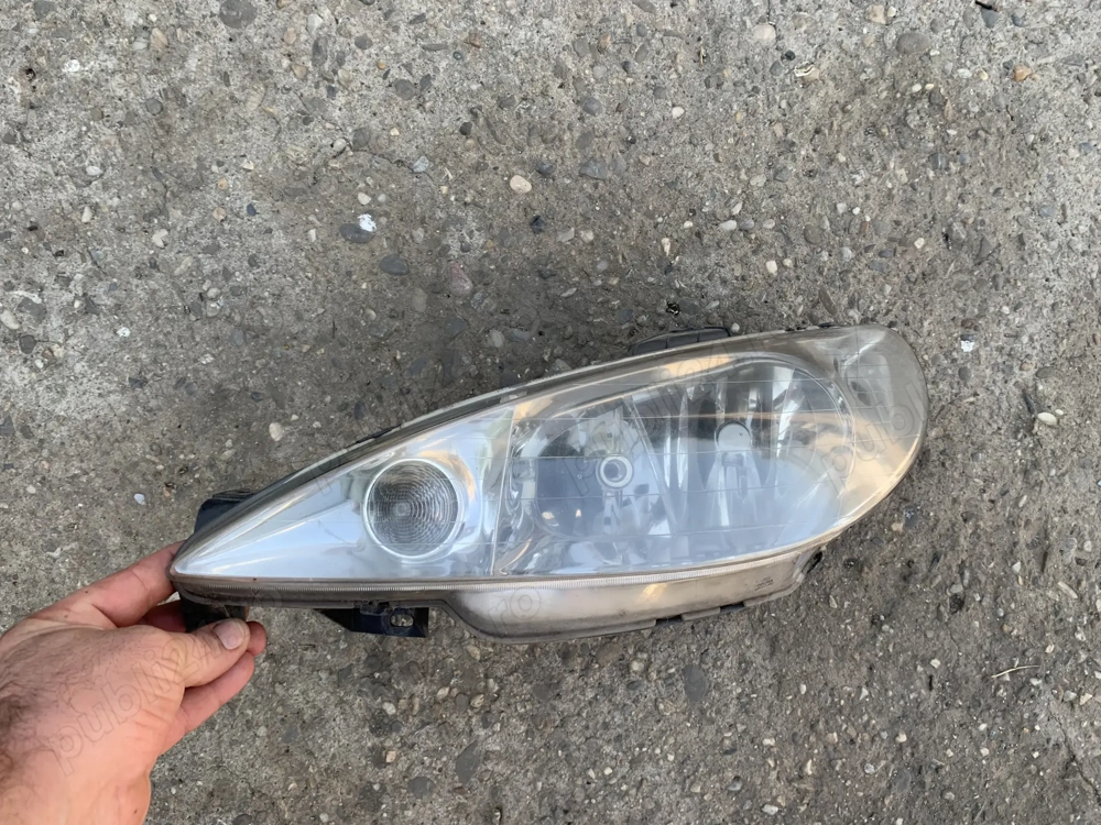 Far stanga peugeot 206