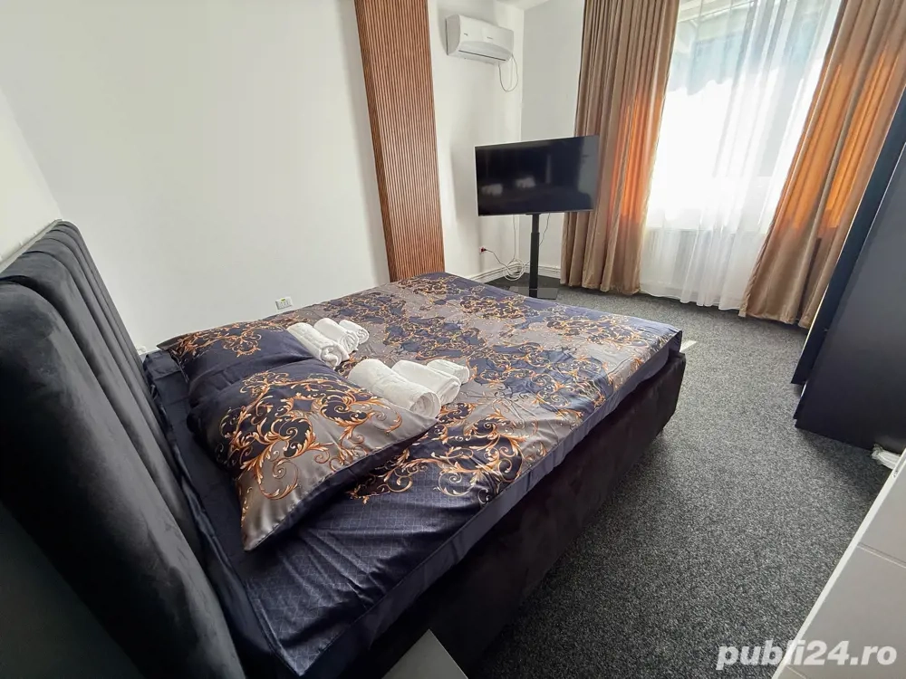 Apartamente centru regim hotelier curte + parcare privata