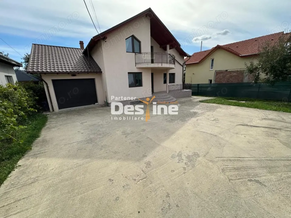 Pașcani - Vilă modernă, curte spațioasă 1000mp, terase, garaj și demisol
