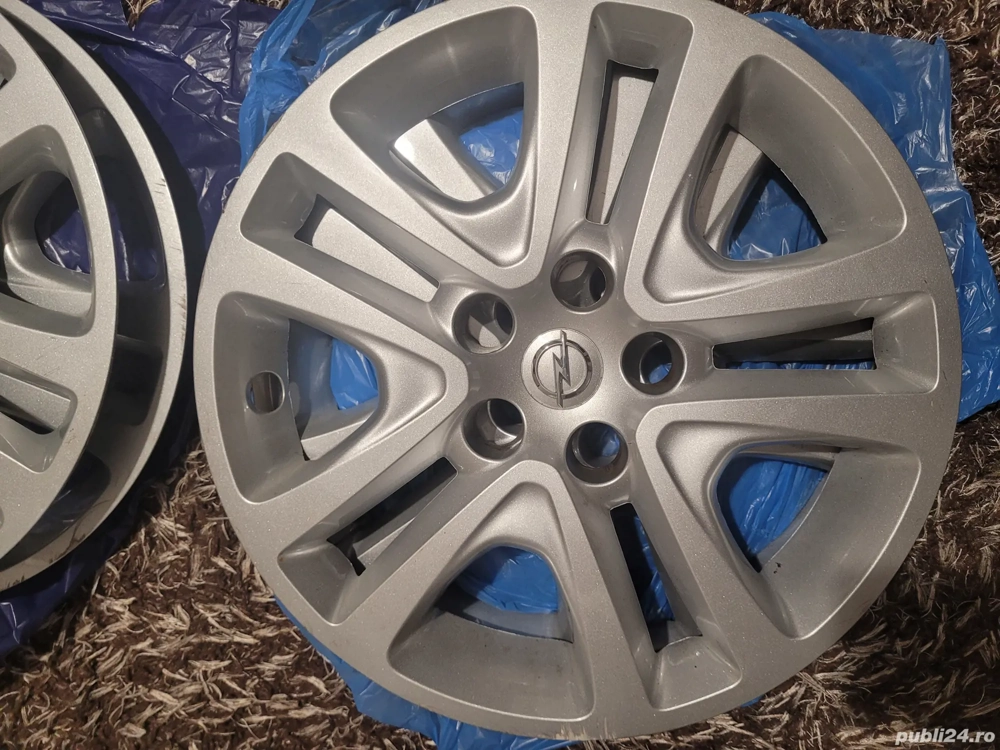 Capace Opel pentru jante structurale.disponibil 3 buc.pret pe buc.