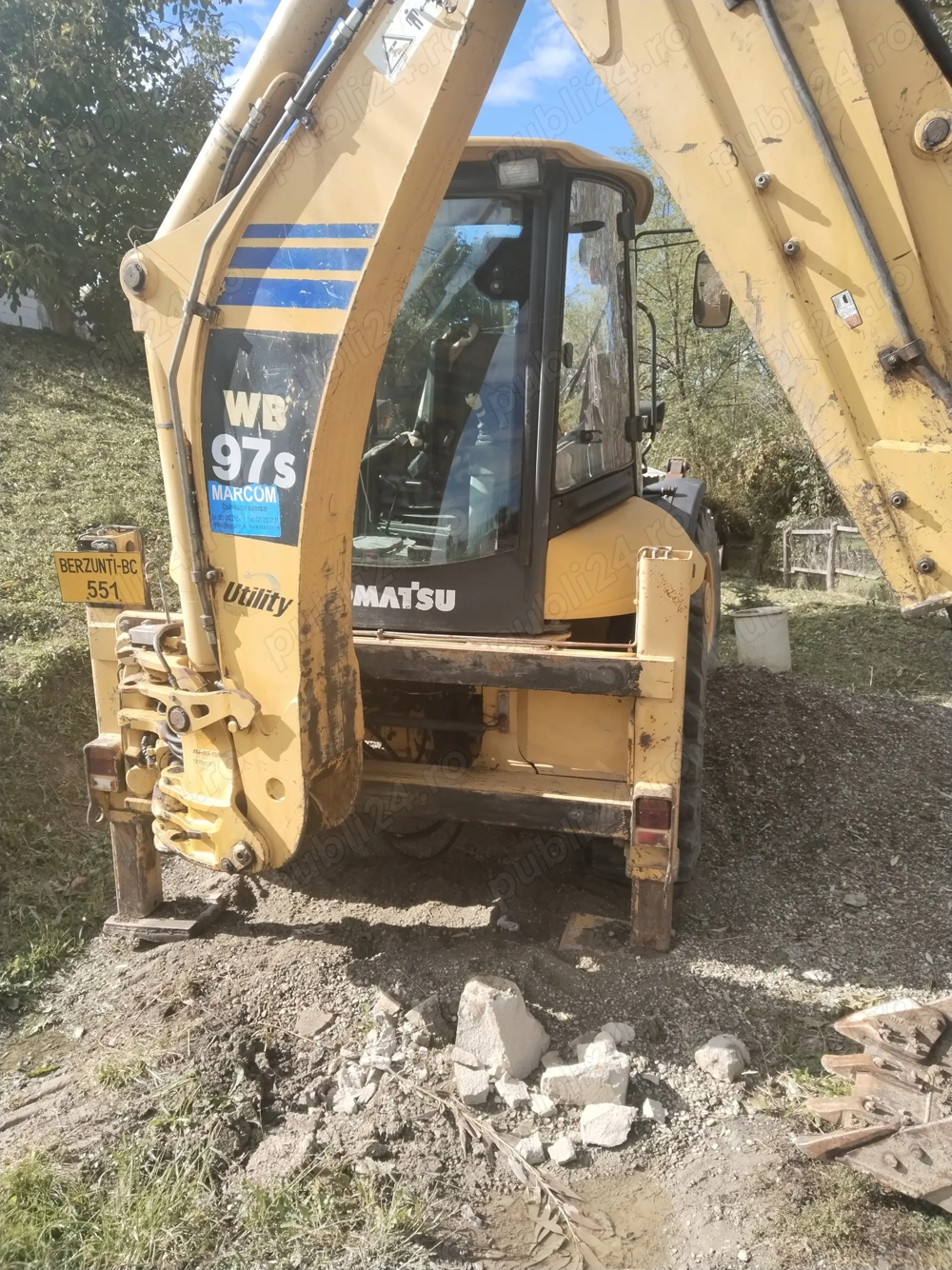 Buldoexcavator Komatsu 97s 