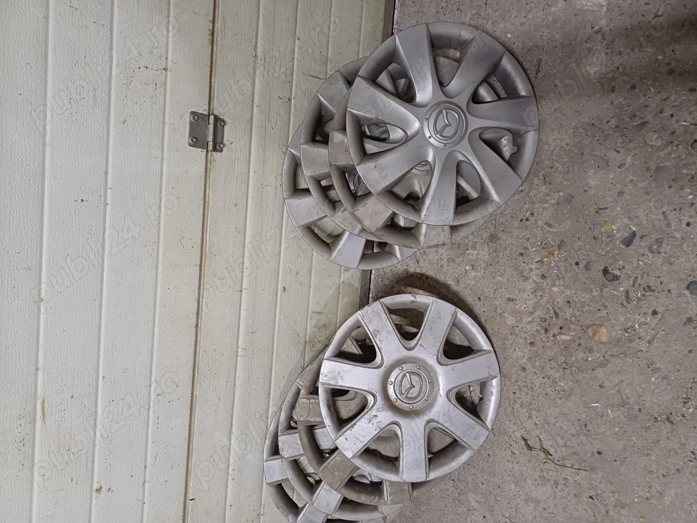 capace roata mazda 3 pe 15