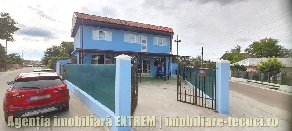 Spaţiu multifuncţional 202mp şi casă de locuit la Drăgăneşti