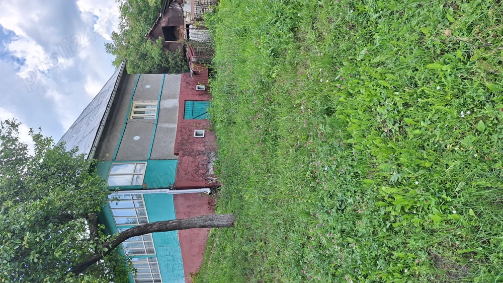 Casa cu teren aferent