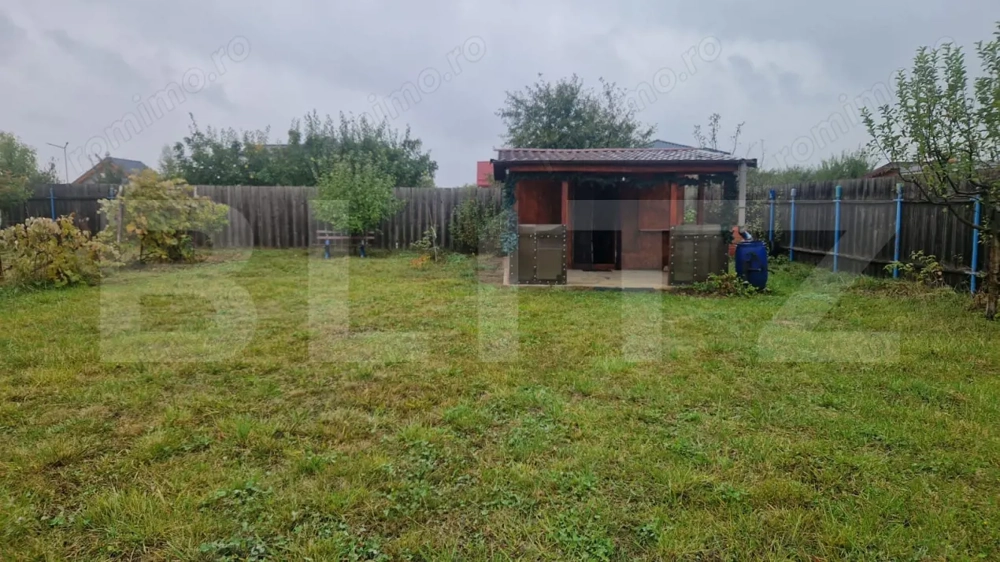 Teren Intravilan Harman cu utilitati , ingradit si casauta de lemn pe teren