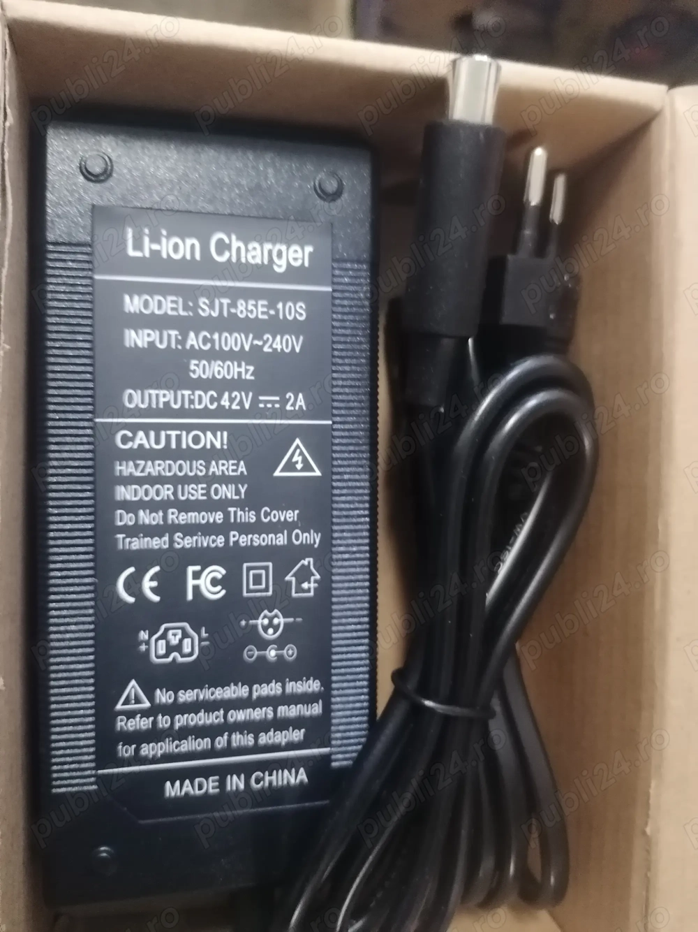 Incarcator trotineta bicicleta electrica 99 ron NOU  42v 2A model XIAOMI