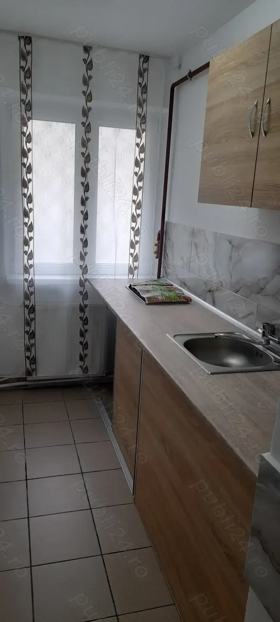 Vand apartament cu doua camere la parter