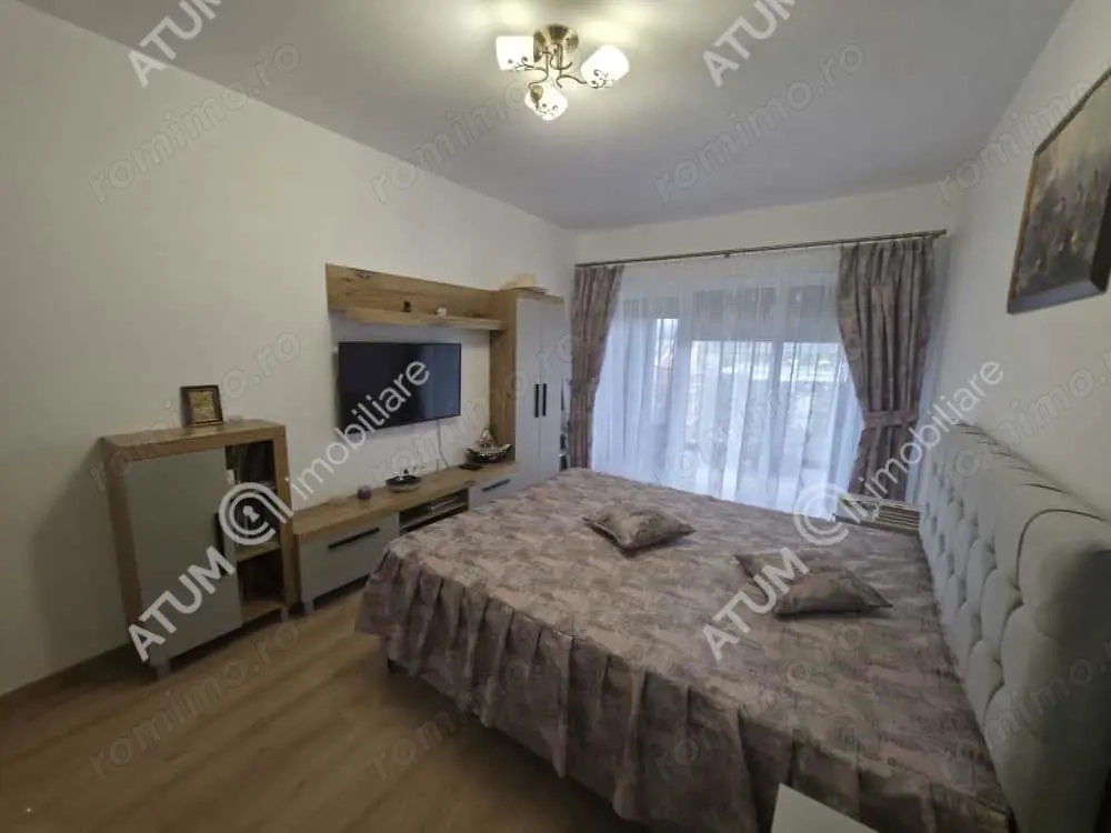 Garsoniera decomandata cu balcon si parcare in zona DaVinci din Sibiu
