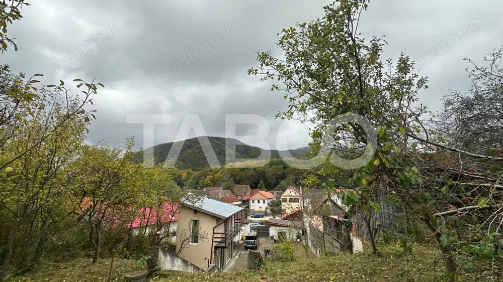 Casa individuala COMISION 0% cu 2 corpuri curte mare in Cisnadioara 