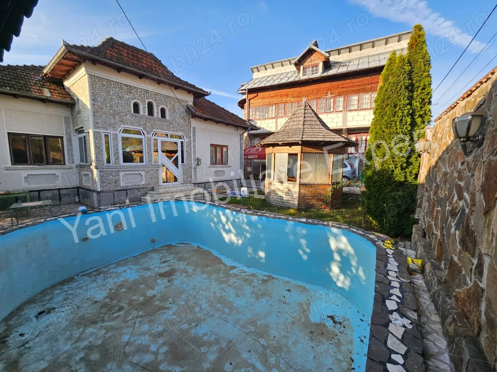 Casă + spațiu comercial de vânzare în comuna Băiculești, sat Tutana, județ Argeș.