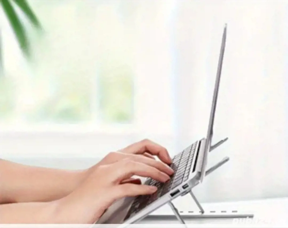 Suport stand universal pentru: laptop,tabletă ,tastatură sau telefon .