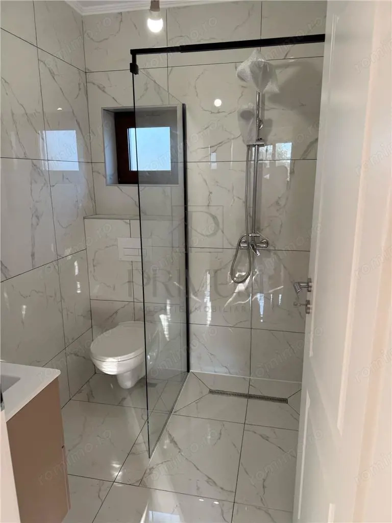 Utvin- 4 camere- teren generos-toate utilitatile strada asfaltata