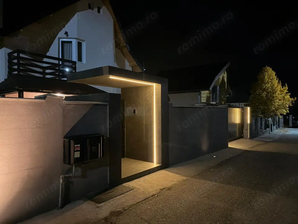 Casă modernă complet renovată, cu curte amenajată și sisteme inteligente