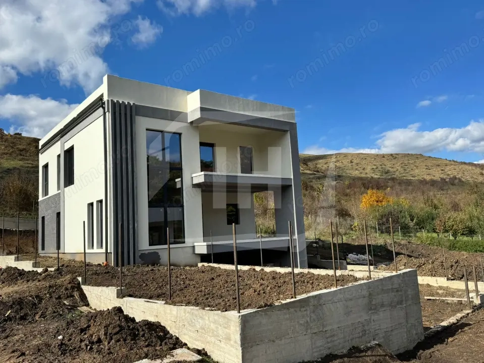Casa Individuala finalizata, 2 garaje. zona Roata Faget
