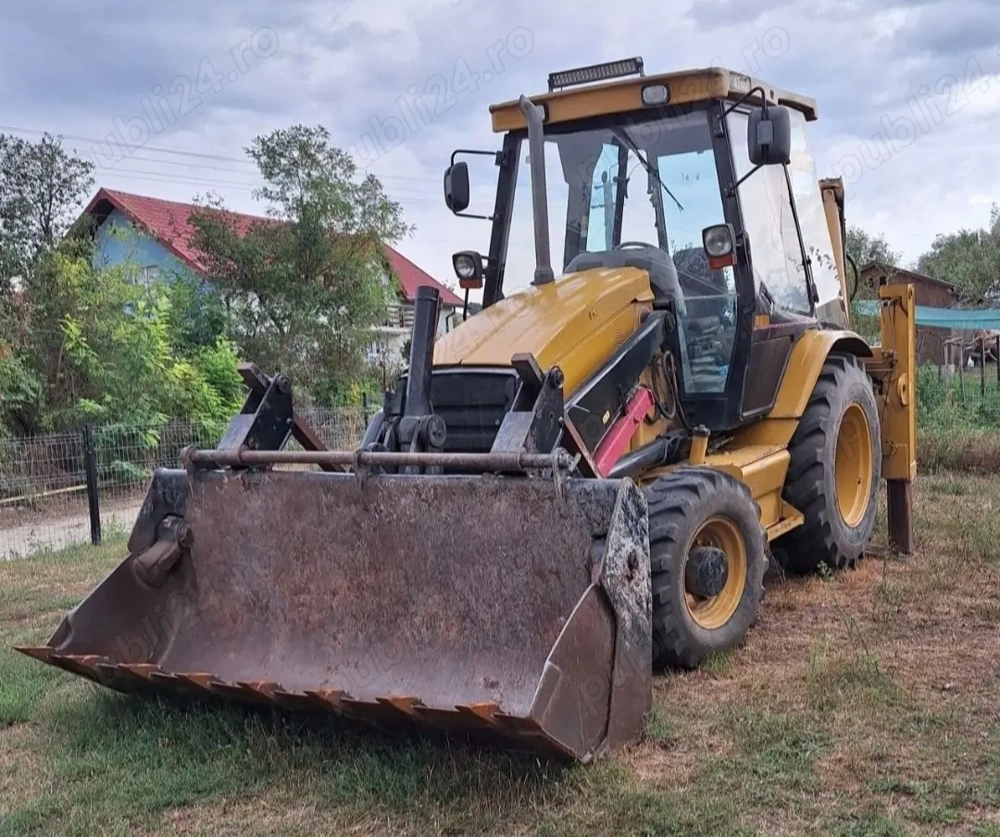 Vând sau schimb Buldoexcavator Caterpillar 2005