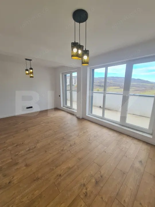 Apartament finisat, 52 mp utili, terasa 34 mp, zona Terra